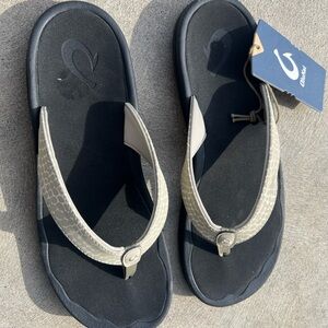 Brand new Olukai sandals women’s size 10.